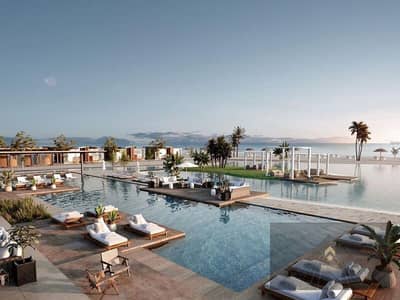 Chalet for sale, 2 bedrooms, directly on the Ras El Hekma beach at kilometer 193
