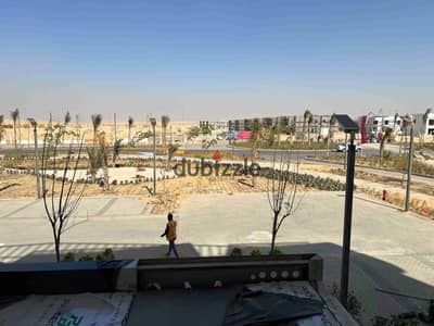 شقه للايجار بكمبوند باديه بالم هيلز 177م تشطيب مودرن اول سكن فيو مفتوح بجوار طريق الواحات و جامعه MSA