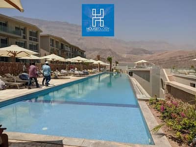 At the lowest price in Il Monte Galala Ain Sokhna, a finished chalet with air conditioning, a distinctive view of the sea and the lagoon, in installments