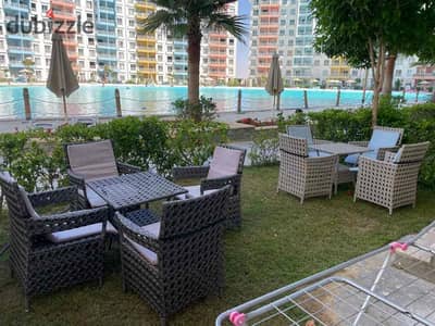 Chalet for sale on the ground floor with a garden, Sea Lagoon, Porto Marina, fully finished, furnished, immediate delivery