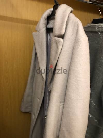 بالطو فرو حريمي off-white