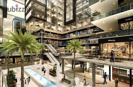 Shop for sale, 20 square meters, in the heart of 6th of October City, directly in front of the monorail station and on the central axis. With only a 1