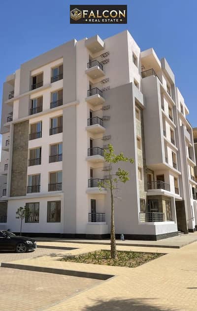 Apartment for sale with a garden, fully finished and ready for viewing, in the heart of Sheikh Zayed, next to SODIC and Emaar. Down payment of 330,000