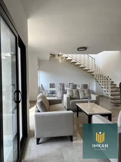 Penthouse for sale, finished with air conditioning and garage, with a stunning view of green spaces and swimming pools in 90 Avenue Compound, Fifth Se