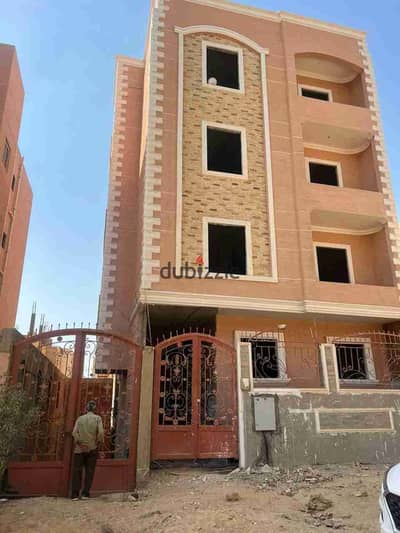 Building for sale in October on Al-Wahat Road
