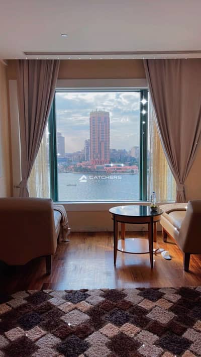 First-row Maadi Corniche apartment, finished+furnished + ACs, direct Nile view, Reve du Nil Tower, next to Hilton, high USD return, minutes to ZamalK