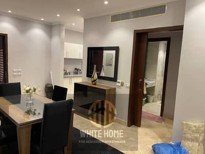 Apartment one bedroom , ultra modern finishing ,fully furnished for rent at village gate,  special price near to American university and sodic, Mivida