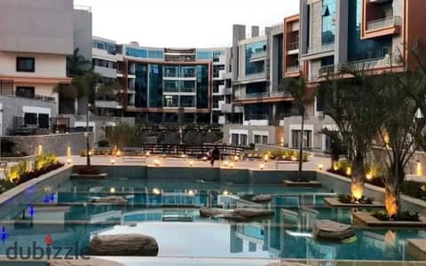 3-bedroom apartment with a stunning view for quick sale, available on installment plans at an unbeatable price in the most prestigious community in Mo