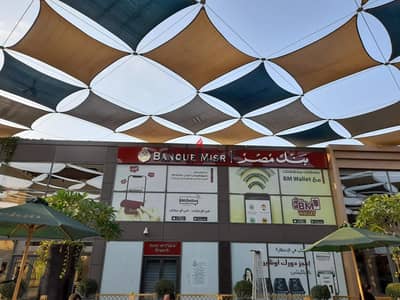 Ground floor shop for rent, 100 sq m, in Walk of Cairo, prime location inside the mall in Beverly Hills, Sheikh Zayed