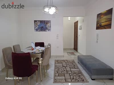 For rent, a furnished apartment in Gardenia City, Nasr City, near the mall