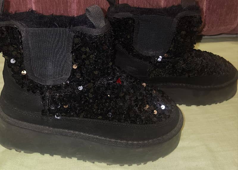 A black half boot 1