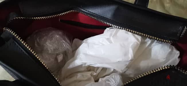 شنطة يد حريمي