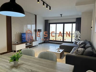 Furnished duplex for rent in Porto New Cairo, panoramic view overlooking Park Mall, 90th Street, and the American University.