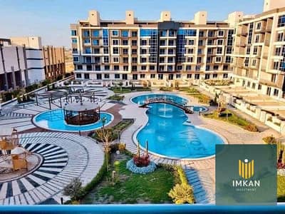 Apartment for sale in Prime location with no maintenance, a 48% discount on cash and in installments over 8 years in the Isola Sheraton compound in New Cairo