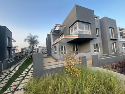 Fully finished ground floor apartment with a private garden for sale in a prime location in October City, next to Mall of Arabia – One33.