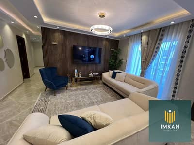 شقة متشطبة بالتكيفات والفرش للبيع بعائد شهرى بالدولار فى العاصمة الادارية بالتقسيط _ العاصمه ار 7