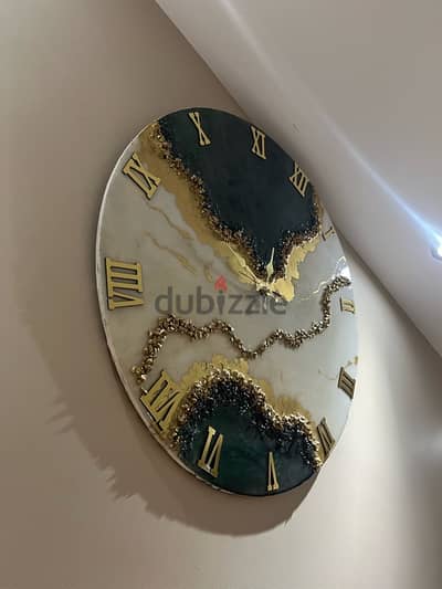 ساعة حائط ريزن