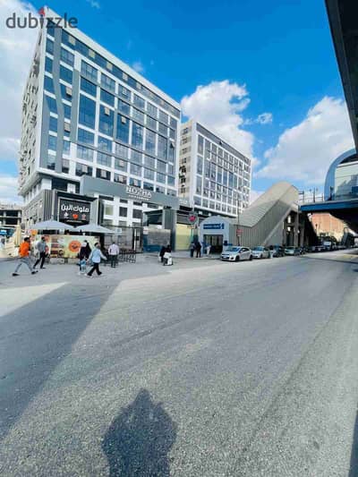 Commercial store for sale in the largest commercial and administrative mall on the main Suez Bridge
