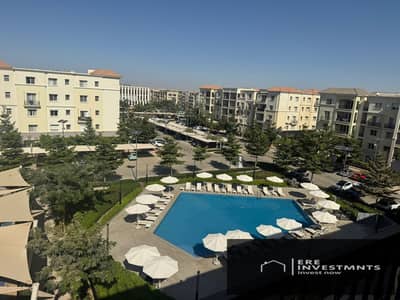 lowest price resale apartment with premium finishing and swimming pool view for sale with the lowest down payment - immediate delivery in Mivida Aven