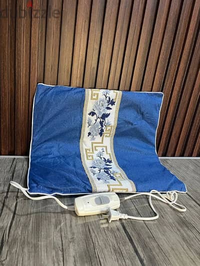 وسادة تدفئه كهربائية