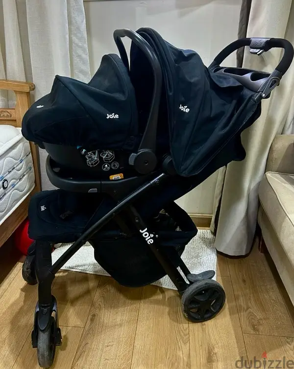 Cochecito y asiento de coche Joie en venta