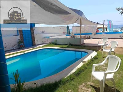 Villa on the beach directly swimming pool and garden private entrance to the shore Agamista honeymoon El-Betash Al-Agami Alexandria