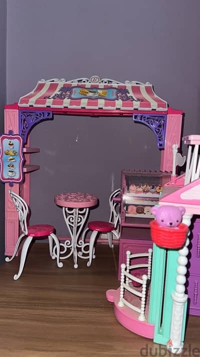 Barbies, barbie house, and barbie bus for sale