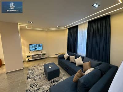 A furnished apartment for rent in Al-Rehab, super lux, 90 meters directly in front of Gate Way, ground floor with garden view, first occupancy.