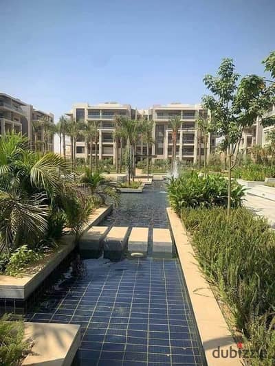 Apartment for sale, fully finished, with a private garden, in a very distinguished location, with installments on the landscape, in a compound in Shor