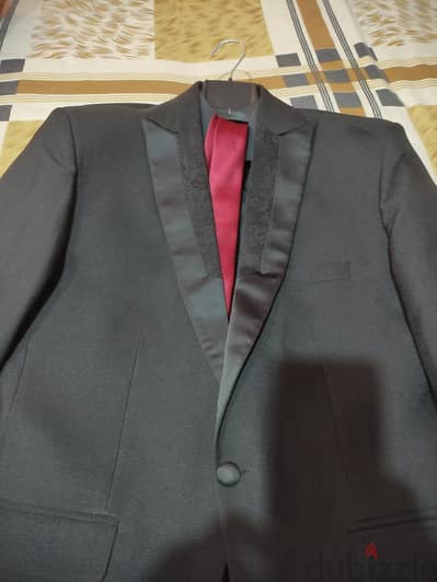بدلة رجالى اسود استعمال مرة واحدة