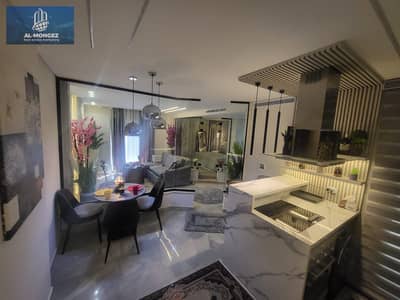 Furnished studio apartment for rent in Madinaty, super deluxe, next to services, with an open garden view.