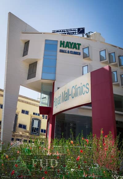 For sale: 43 m² medical clinic on El Shabab St, Southern Central Axis, Sheikh Zayed, fully finished, AC, direct from owner.