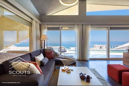 Fully finished. . chalet for sale directly on the sea, immediate handover, in a prime location in Ain Sokhna, in La Vista Gardens, with an open sea