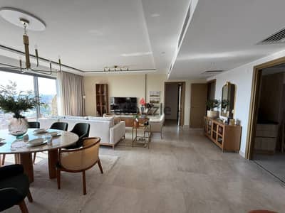 A fully finished hotel-style apartment with air conditioning for sale in Sheikh Zayed by ORA.