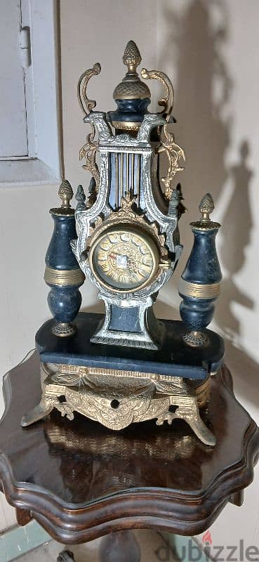 ٢  شمعدان و ساعة