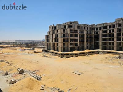 Fully finished apartment for sale with air conditioning in El Karma Compound, prime location in Sheikh Zayed.