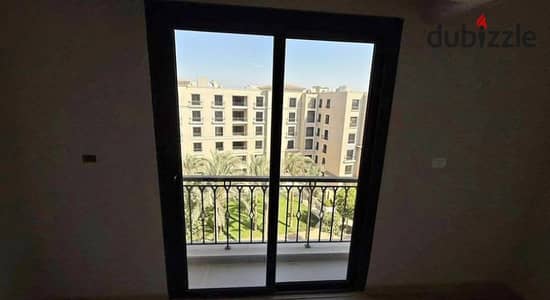 Fully finished apartment with ACs for sale in a prime location in the heart of Sheikh Zayed, ready to move, in Village West Compound.