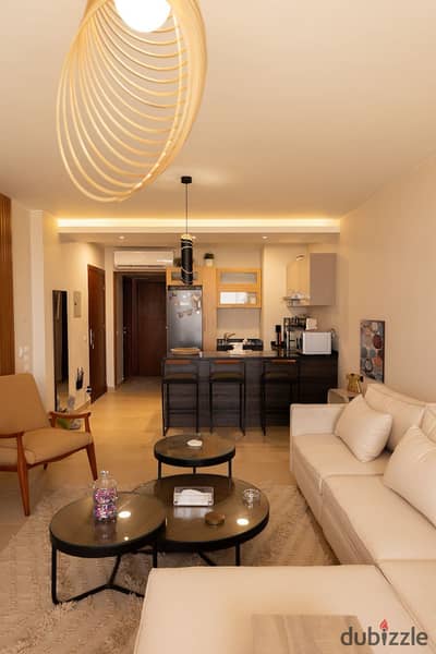 Ready-to-move-in chalet for sale in Azha Ain Sokhna, fully finished with air conditioning.