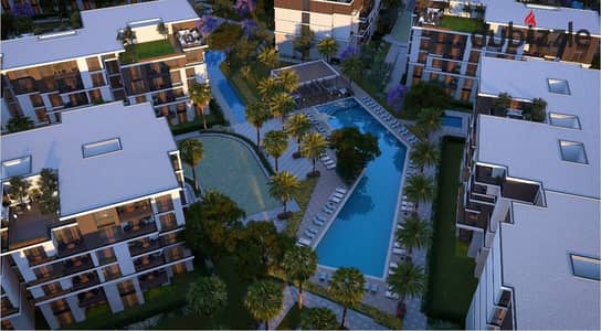 Apartment for sale in Tesla Residence Compound, Tesla, October Gardens on Al Wahat Road directly in front of MSA University at an investment price and longest payment period.
