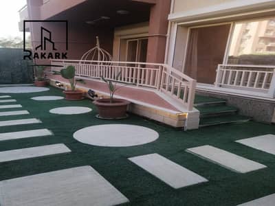 Hotel-furnished and air-conditioned apartment with a large garden on the ground floor in a compound | 250 meters