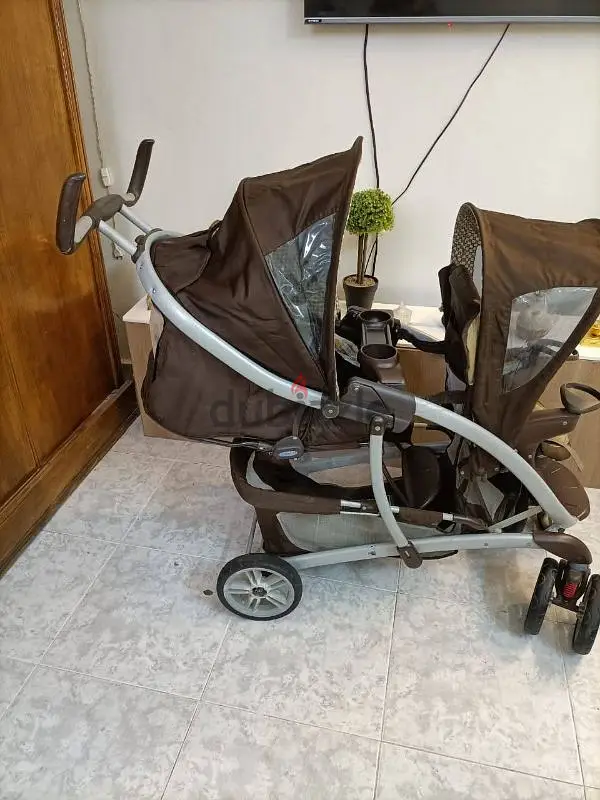 a brown stroller for twinz