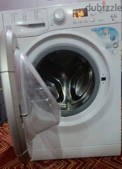 اريستون سعه9ك غسيل ومجفف6ك ماتور انفرتر1200لفه بولندى الصنع بحاله جيده