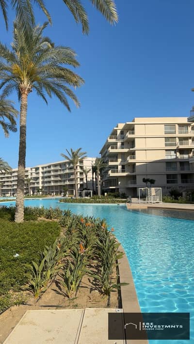 Furnished two-bedroom chalet with air conditioning and kitchen for sale with payment facilities and a distinctive view in Marassi (Marina Views) - Nor