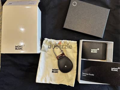 Genuine Montenlanc leather keychain. dark grey