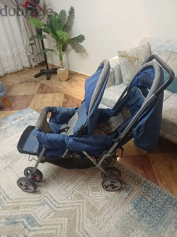 عربة بيبي مزدوجة للتؤام65581048629505121