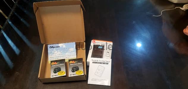 فرصة عدد 2بطاريةDaprodua+ شاحنDaprodua  مع وصلة USB وارد امريكا