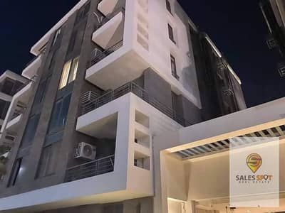 Duplex for sale with a down payment of 293,000, featuring a view and located opposite Cairo Airport in the Taj City compound.