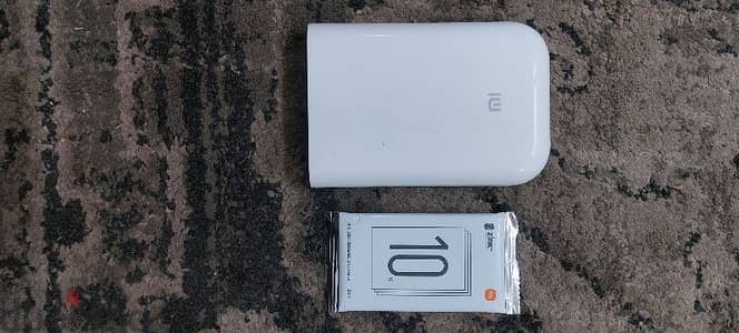 Xiaomi Mi Portable Photo Printer طابعه حراري بدون حبر من شاومي