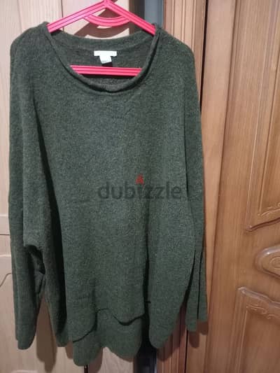 ( أي بلوفر مقاس كبير سعر الواحد ٥٠٠ج ).