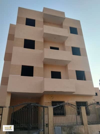 partment building for sale - Badr City - Sixth District - Prime investment and upscale location. "
